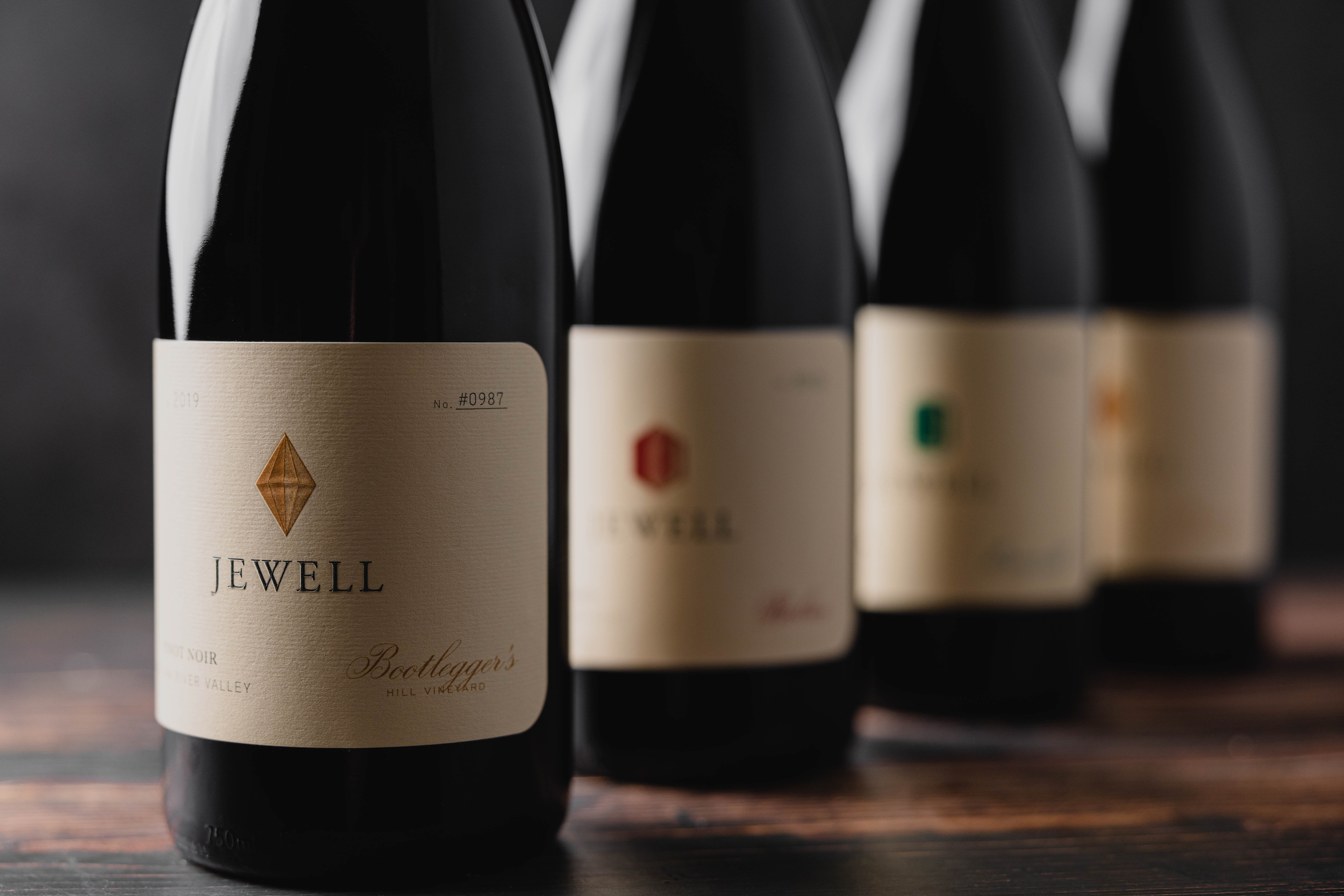 Jewell Wine bottles lined up in a row